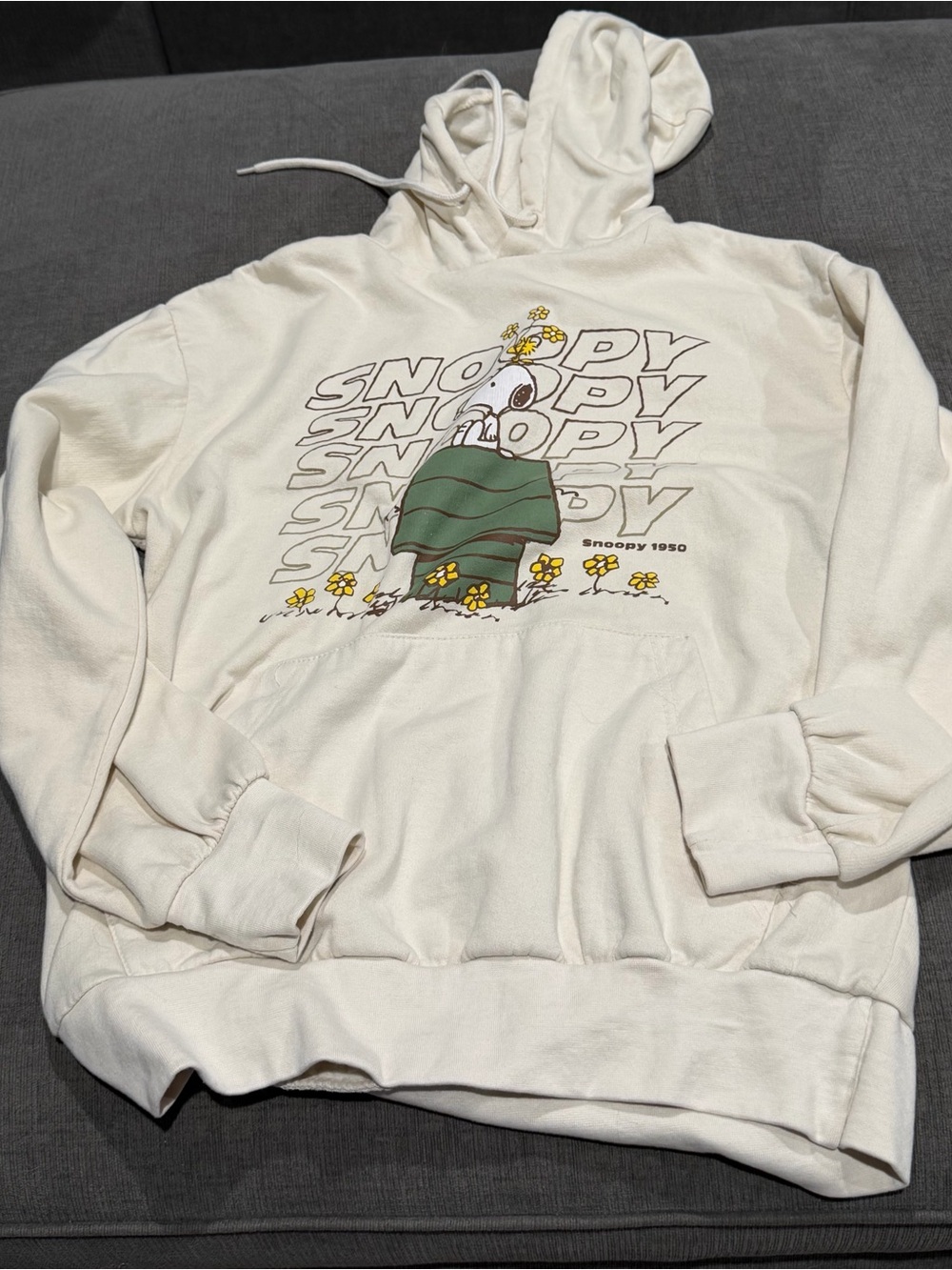 Peanuts Cream Hoodie with Green Snoopy Graphic
